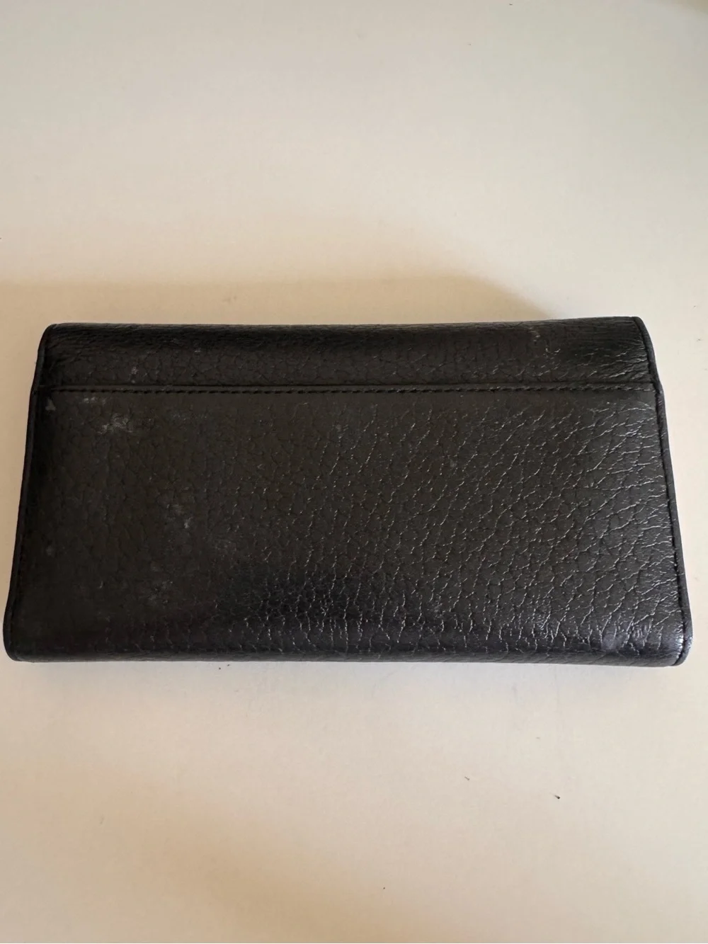 kate spade Black Pebbled Leather Fold Wallet with Gold Logo